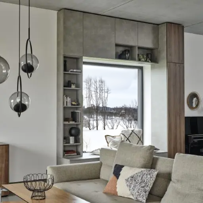 Sideboard mit Sitzbank und Fensterumrandung im Wohnzimmer