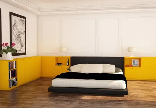 Bettumbau Sideboard in Gelb im Schlafzimmer.
